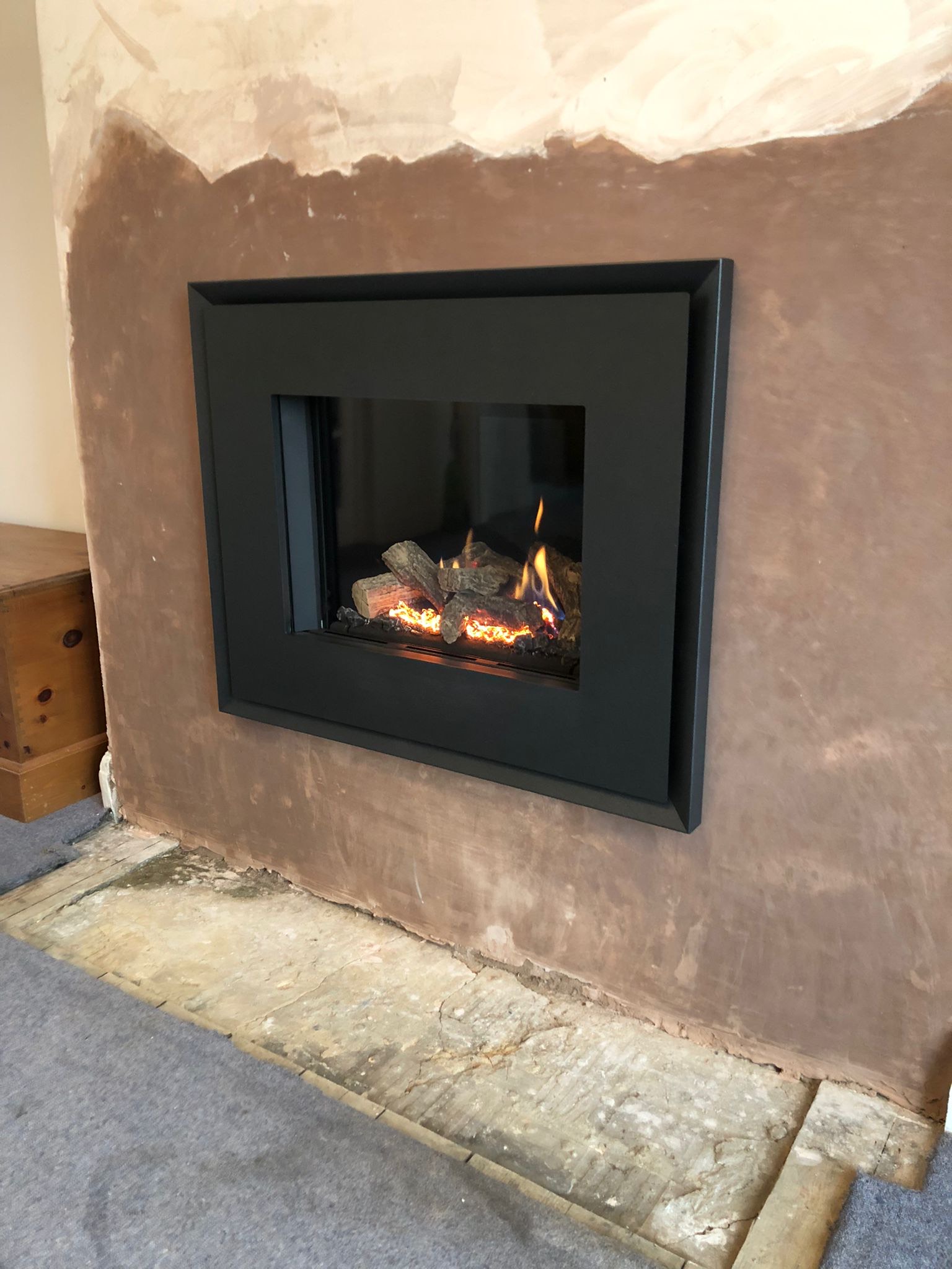 Contemporary Log Effect Gas Fire Installation Harrow Rigbys