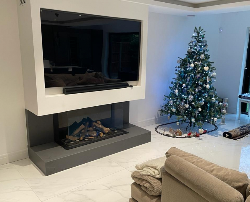 Contemporary Hole in the Wall Gas Fire Installation in Pinner.