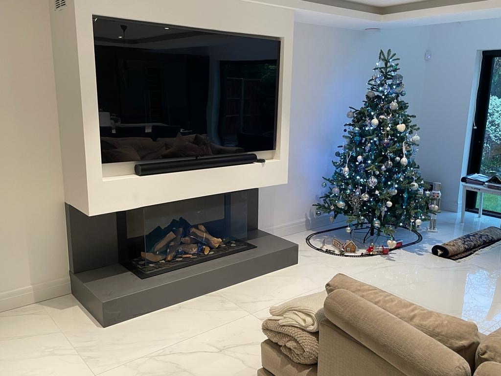 Contemporary Hole in the Wall Gas Fire Installation in Pinner.